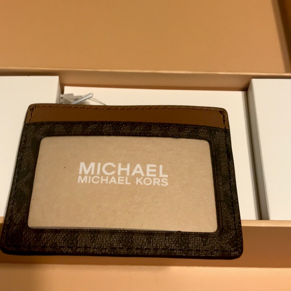 Michael Kors bland new  purse never used or out of original box brown and gold